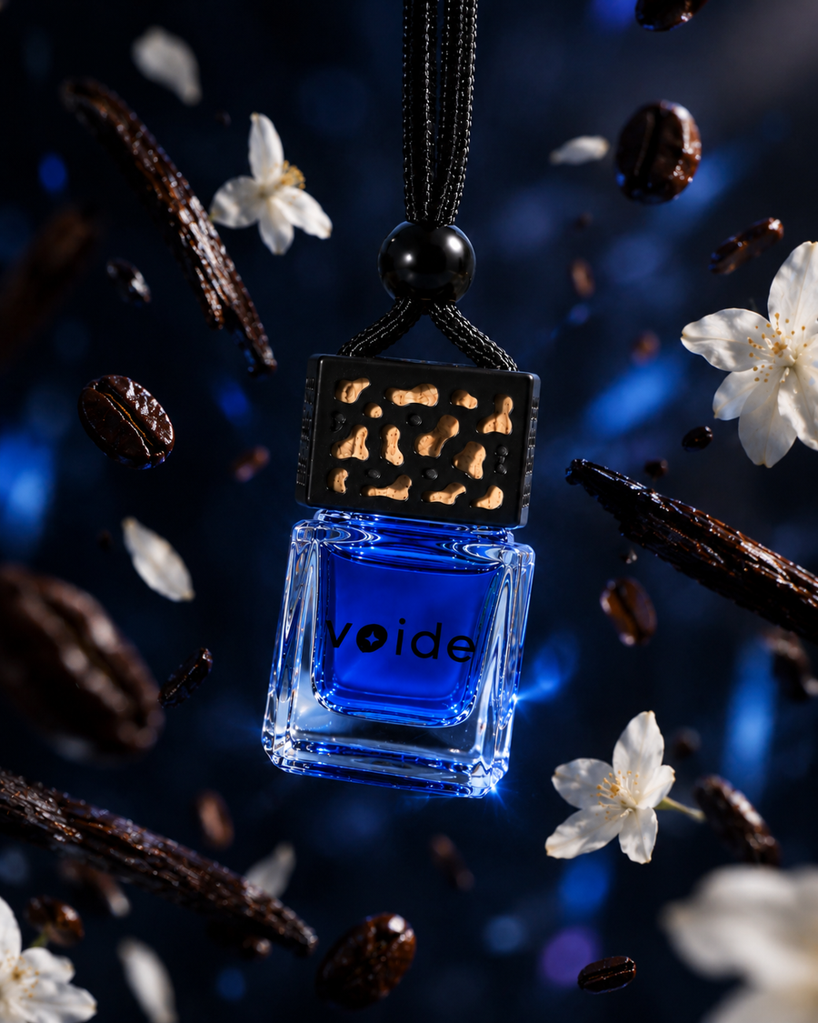 Descent car fragrance bottle with flying coffee beans, vanilla and white flowers